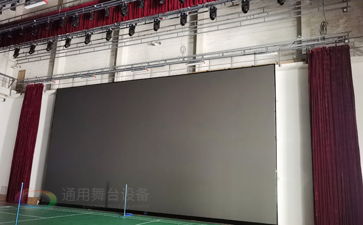 廣州黃花崗禮堂選擇通用舞臺！禮堂舞臺阻燃幕布、吊桿、舞臺燈光項目圓滿竣工！